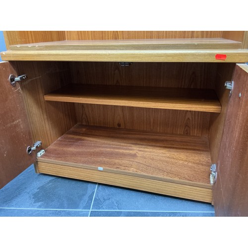 38 - A Modern Oak Effect Three Shelf Over Two Door Illuminated Bookshelf - Approx 43cm x 74cm x 195cm. Li... 