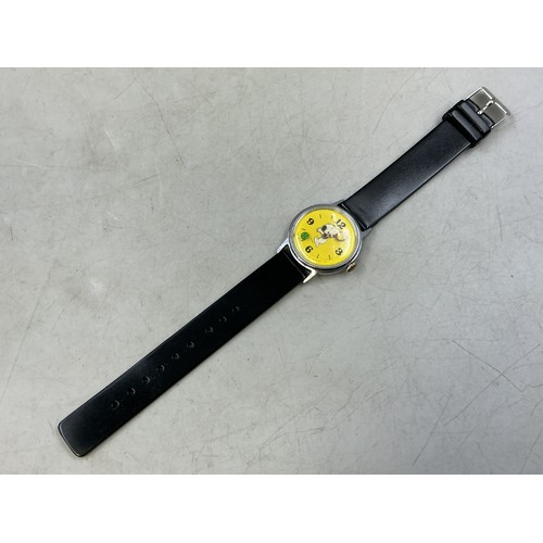 A Vintage 1958 Syndicate Mechanical Snoopy Tennis Watch - Snoopy ...