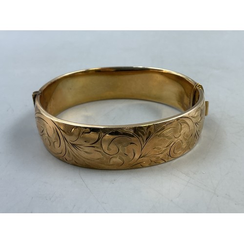 11 - An Antique Rolled Gold Etched Bangle