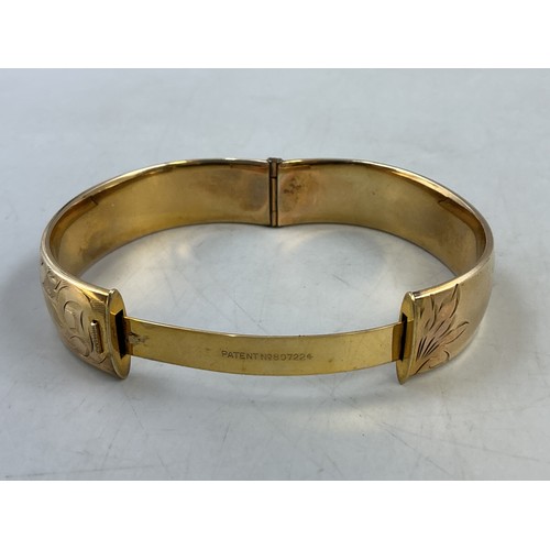 11 - An Antique Rolled Gold Etched Bangle