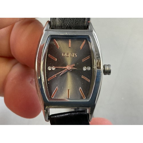 108 - A Ladies Designer Oasis Quartz Watch, In Presentation Box - Black Clear Stoned Dial, Stainless Steel... 