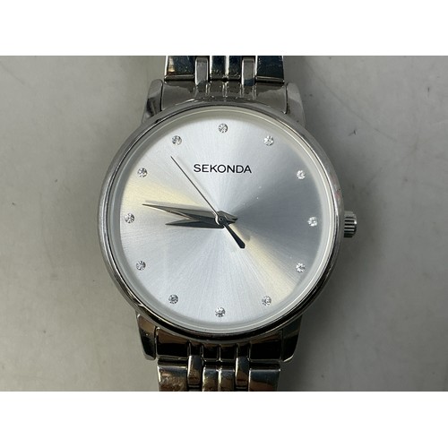 140 - A New Ladies Sekonda Quartz Watch - Clear Stoned/Brushed Metal Dial, Stainless Steel Case, And Origi... 