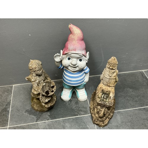 648 - Three Garden Statues to Include Two Gnomes and a Flower Girl Tallest 25