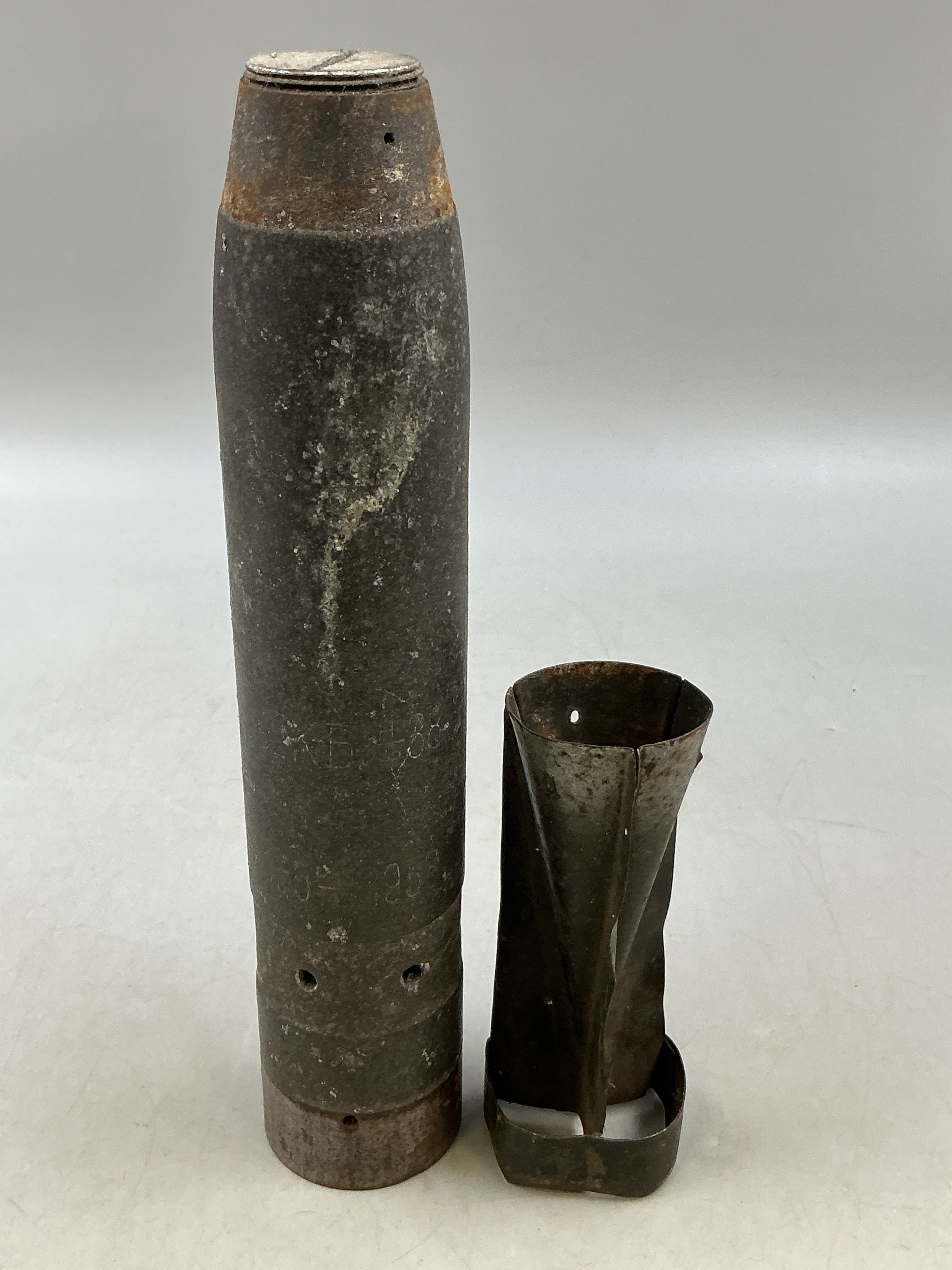WW1 incendiary bomb 15cm long x 5cm diameter and a tail fin from a WW2 ...