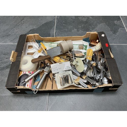 797 - A Box of Assorted Kitchenalia - Unsorted Cutlery, Baking Tins, 'PARTY' Dishes, And More