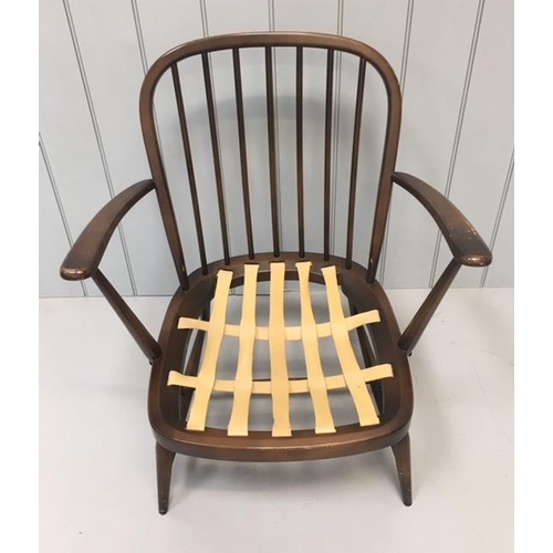 155 - A vintage Lounge Chair, very similar to the Ercol Lounge Chair. The chair has original seat covering... 