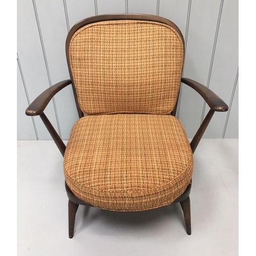 155 - A vintage Lounge Chair, very similar to the Ercol Lounge Chair. The chair has original seat covering... 
