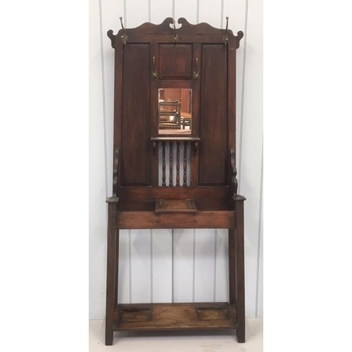 20 - A fine oak hallstand, with brass hooks.
Dimensions(cm) H205 W92 D30