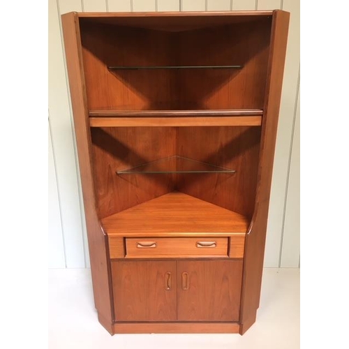 74 - A lovely G-Plan team mid-century corner cabinet. Triple shelved above a single drawer and 2-door cup... 