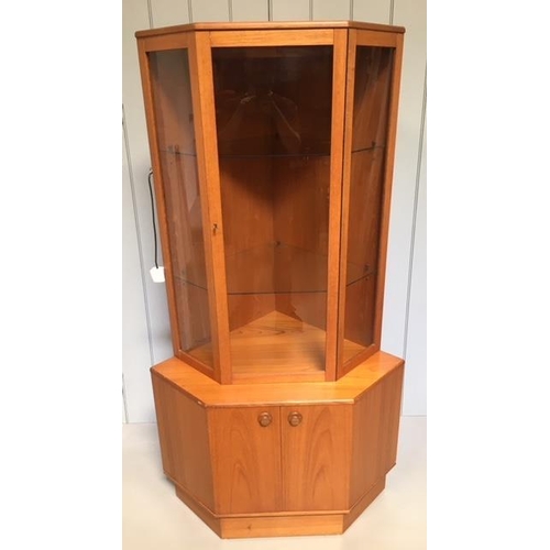 77 - A mid-century teak corner display cabinet by Turnidge of London. A glass doored, 2 shelved, display ... 
