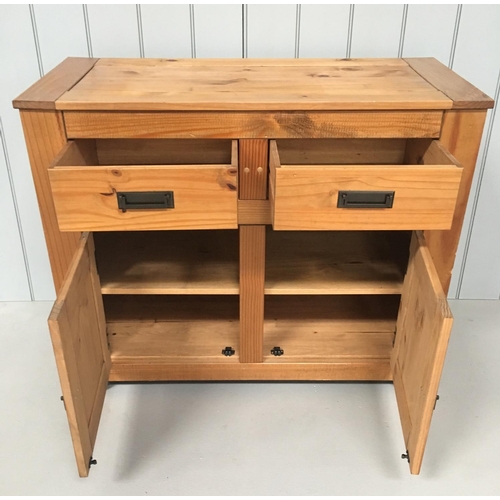 84 - A dark Pine narrow sideboard. 2 drawers above a single-shelf, 2-door cupboard.
Dimensions(cm) H84 W1... 
