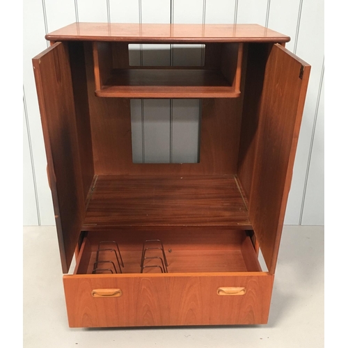 76 - A G-Plan Teak TV Cabinet. 2-door cupboard, over a single drawer. Drawer has dividers in place. Unit ... 