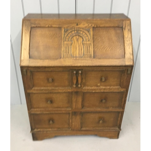 67 - An attractive Arts & Crafts Bureau. Drop-Down desk area supported by auto-supports. Leather writing ... 