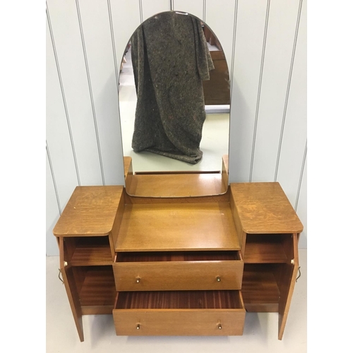 109 - A traditional single mirrored dressing table by Austinsuite. The large mirror sits over 2-drawers an... 