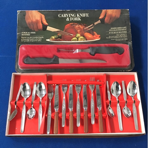 255 - A vintage boxed cutlery set, together with a boxed carving knife set