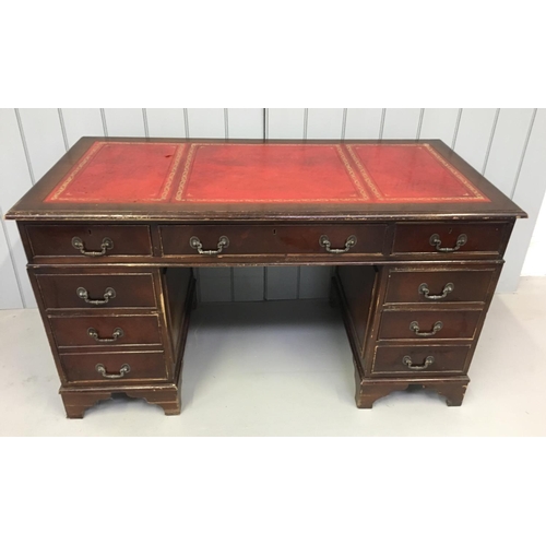 127 - A leather-topped pedestal desk.
3 drawers over 2 (left pedestal) & 3 (right pedestal).
Dimensions(cm... 