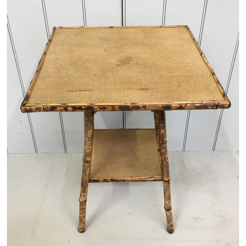 107 - A vintage Bamboo side-table. Hessian topped with a single shelf between tapering legs.
Dimensions(cm... 