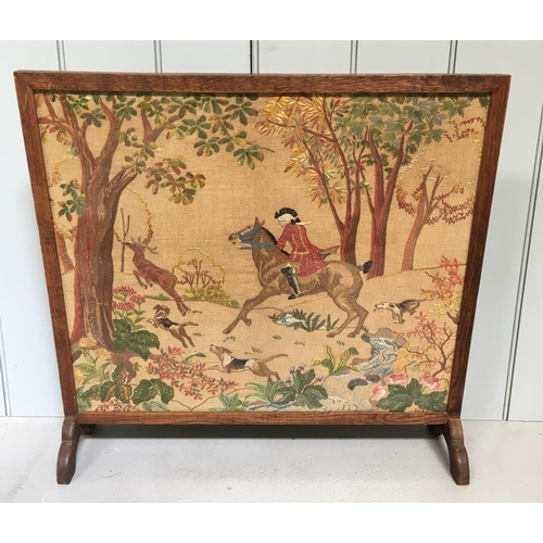 65 - An oak fire screen, with an enclosed inset hunting scene tapestry.
Dimensions(cm) H 61 W65 D17