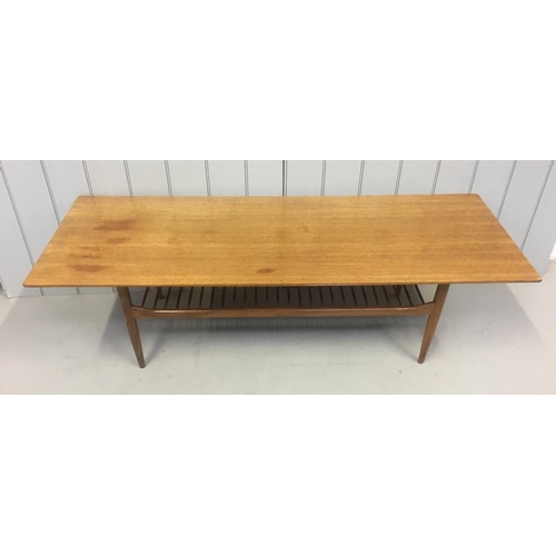 209 - A classic, retro, long teak coffee-table.
Dimensions(cm) H47 W160 D58