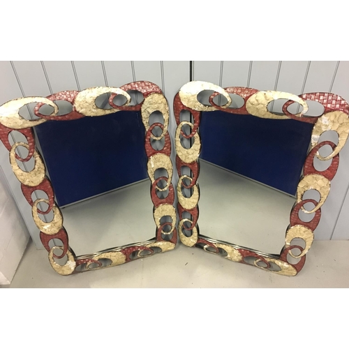 45 - A stunning pair of funky mirrors!
Interlocking, oval metal frame in striking red, yellow, metal colo... 