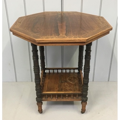 140 - A vintage octagonal occasional table, with lower supported shelf.
Dimensions(cm) H69 W60 D60