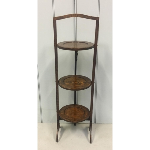 58 - A delightful 3-tiered folding cake stand.
Dimensions(cm) H85 W26 D24