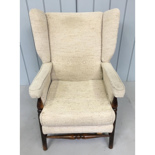180 - A fabric winged armchair.
No webbing present.
Dimensions(cm) H 88 W74 D70