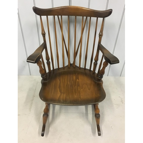154 - A Windsor-style rocking chair by the Yugoslavian Company - Stoe.
Dimensions(cm) H 84 W62 D74