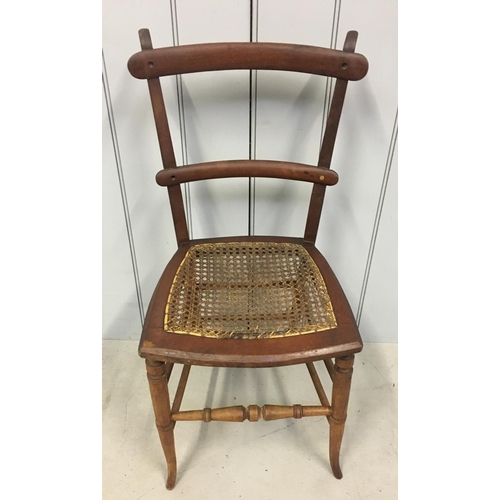 145 - A charming rattan hall chair.
Dimensions(cm) H83 W43 D40