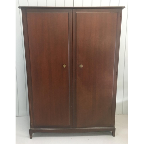 8 - A vintage Stag Minstrel S.150 double wardrobe. Two hanging rails (full and trouser length) and a sho... 