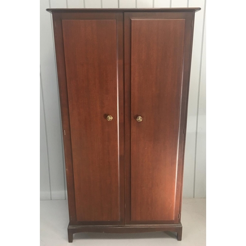 9 - A vintage Stag Minstrel S.156 compactum wardrobe. One hanging rail, a shoe rail and a tie/scarf rail... 
