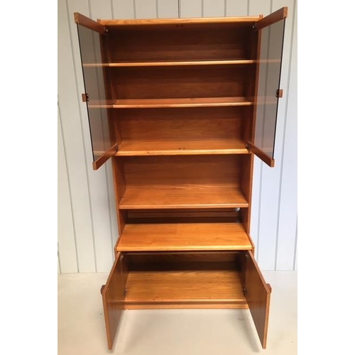 80 - A typical Remploy display cabinet. Glazed display area with 2 shelves, over a single teak shelf, ove... 