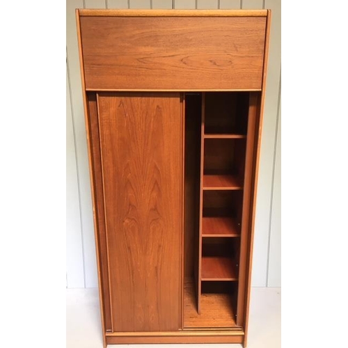 90 - A super mid-century Gents wardrobe by Austinsuite. Hinged top cupboard, over double sliding doors. I... 