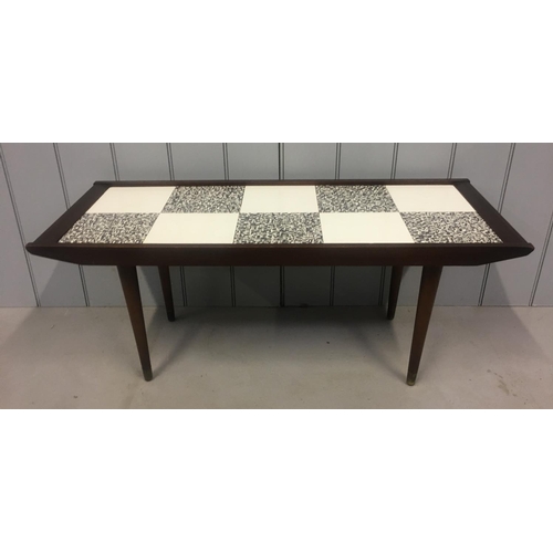 188 - A retro, tile effect coffee table by Remploy.
Dates from 1965.
Dimensions(cm) H41 W100 D40