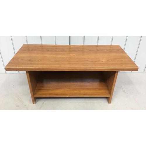 196 - A heavy teak veneered Coffee/TV Table.
Dimensions(cm) H41 W95 D45