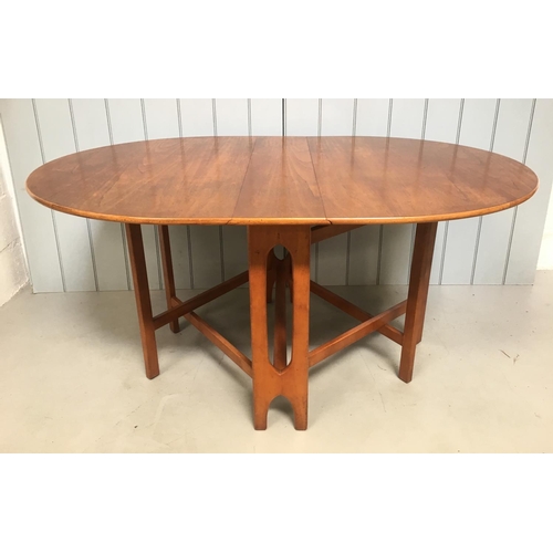 200 - A lovely, retro teak drop leaf table.
Oval shaped.
Dimensions(cm) (Open) H75 W158 D108
(Closed) H75 ... 