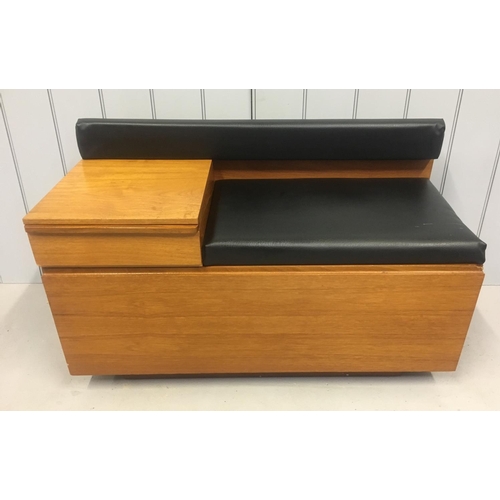 207 - A classic mid-century telephone seat by Chippy. The small table has an integrated drawer with origin... 