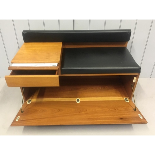 207 - A classic mid-century telephone seat by Chippy. The small table has an integrated drawer with origin... 