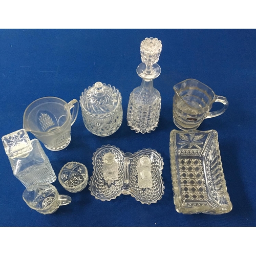 384 - A mixed lot of mainly cut-glass. Includes decanters, fruit bowls, condiments set etc.