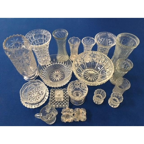 387 - A mixed lot of mainly cut-glass. Includes vases, fruit bowls etc.