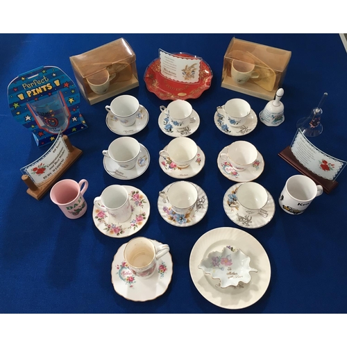 399 - A large lot of mixed celebratory chinaware. Includes several teacups & saucers celebrating wedding a... 