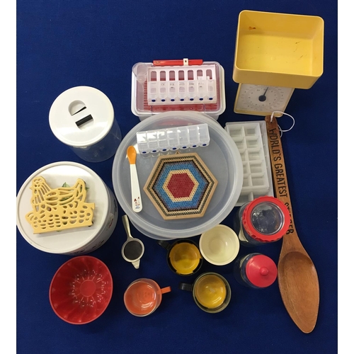 412 - A mixed lot of kitchenware. includes scales, trays, tupperware and a large amount of cutlery etc.