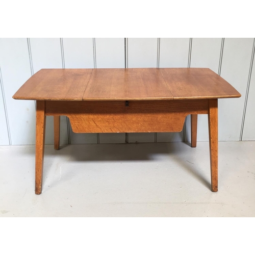 190 - An Eglin sewing table, with hinged centre storage area.
Could be used as a coffee table.
Dimensions(... 