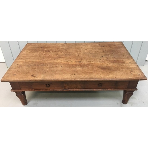 151 - A heavy, hardwood coffee table, with two narrow drawers.
Dimensions(cm) H48 W149 D93