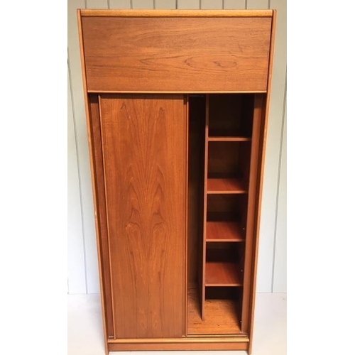 18 - A super mid-century Gents wardrobe by Austinsuite. Hinged top cupboard, over double sliding doors. I... 