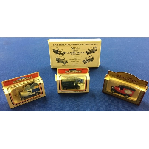 91 - 3 Lledo original cars, together with a Readers Digest Cameo Set.