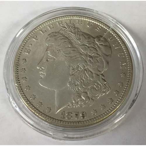 160 - 1879 Morgan Silver Dollar. Certificate of authenticity and presentation folder. 900 Solid Silver.