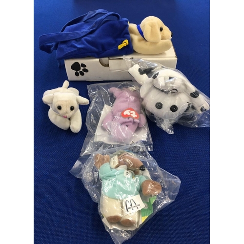 230 - A mixed lot of 5 soft toys. Includes a boxed & certificated Andrex Puppy and two unopened McDonalds ... 