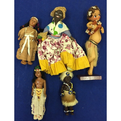 71 - A small selection of Dolls from Africa and America.