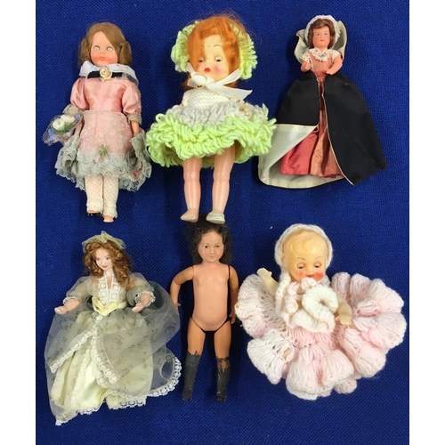 76 - A mixed lot of six vintage dolls. 
Height 15-20cm